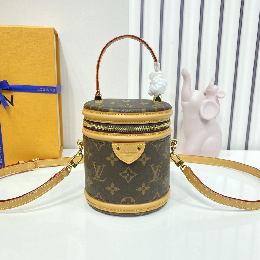 Nano Cannes Wealth Bucket M82952 Old FlowerCut a cylindrical configuration from Monogram canvas which coincides with the design of the makeup bag Th