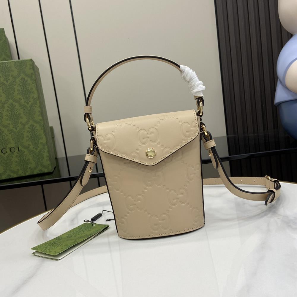 New GG mini bucket bag The initials of the founder of the brand Mr Guccio Gucci add color to leather accessories integrating modern small leather