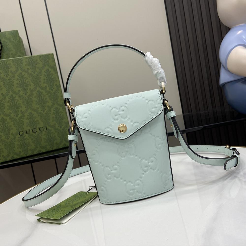 New GG mini bucket bag The initials of the founder of the brand Mr Guccio Gucci add color to leather accessories integrating modern small leather