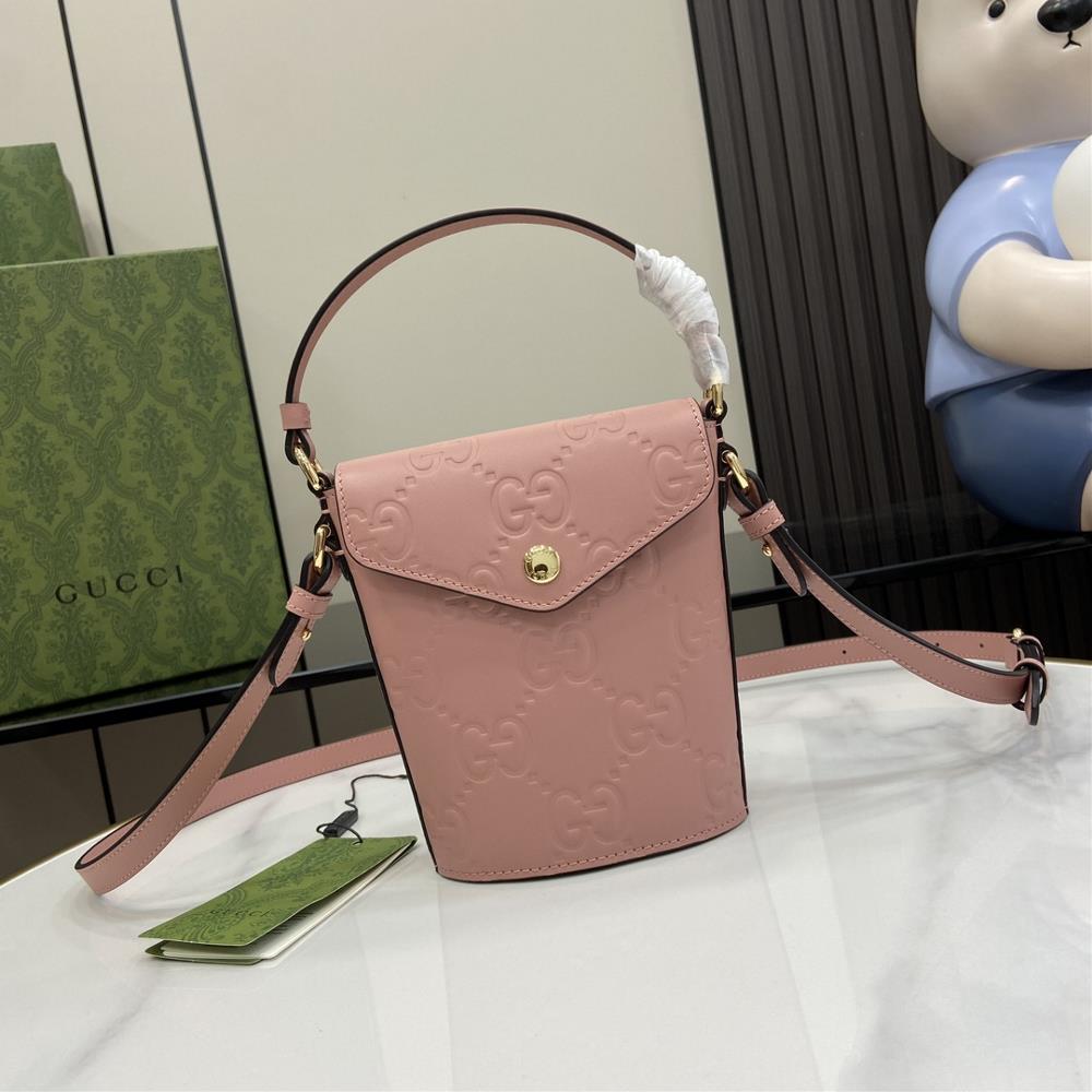 New GG mini bucket bag The initials of the founder of the brand Mr Guccio Gucci add color to leather accessories integrating modern small leather