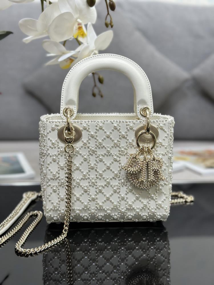 Lady Dior embroidered half a pearl in three squares with lamb tendons inside The handbag embodies Diors profound insight into elegance and beauty