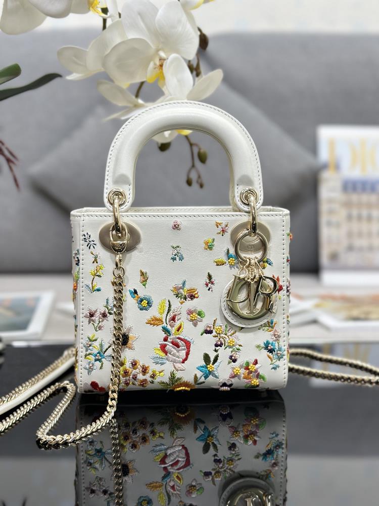 Lady Dior features three embroidered floral beads with sheep tendons inside carefully crafted from milk white cowhide leather and adorned with multic