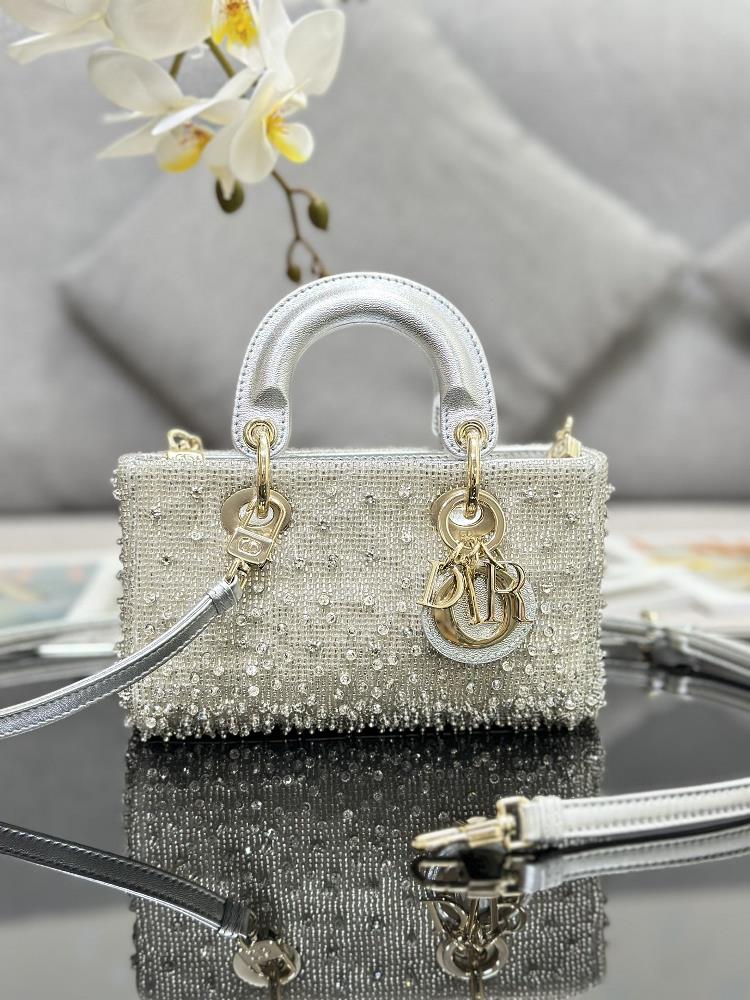 Lady DJoys ultra mini embroidered pearl silver color with lamb tendons inside highlights the minimalist aesthetic of the Lady Dior collection and