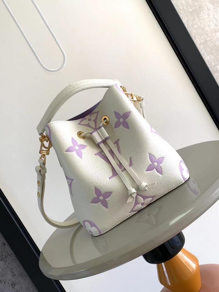 M45709 M45716 Full Leather Mini Bucket Bag This NoNo BB bucket bag features a pink gradient of Monogram Imprente leather rendered Monogram Giant patte