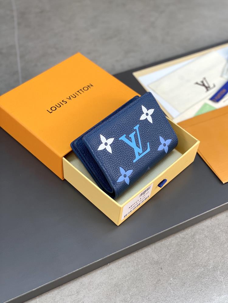 The M82329 blue screen printed Cla wallet is made of Monogram Imprente soft grain cowhide and adorned with Louis Vuittons iconic Monogram pattern Th