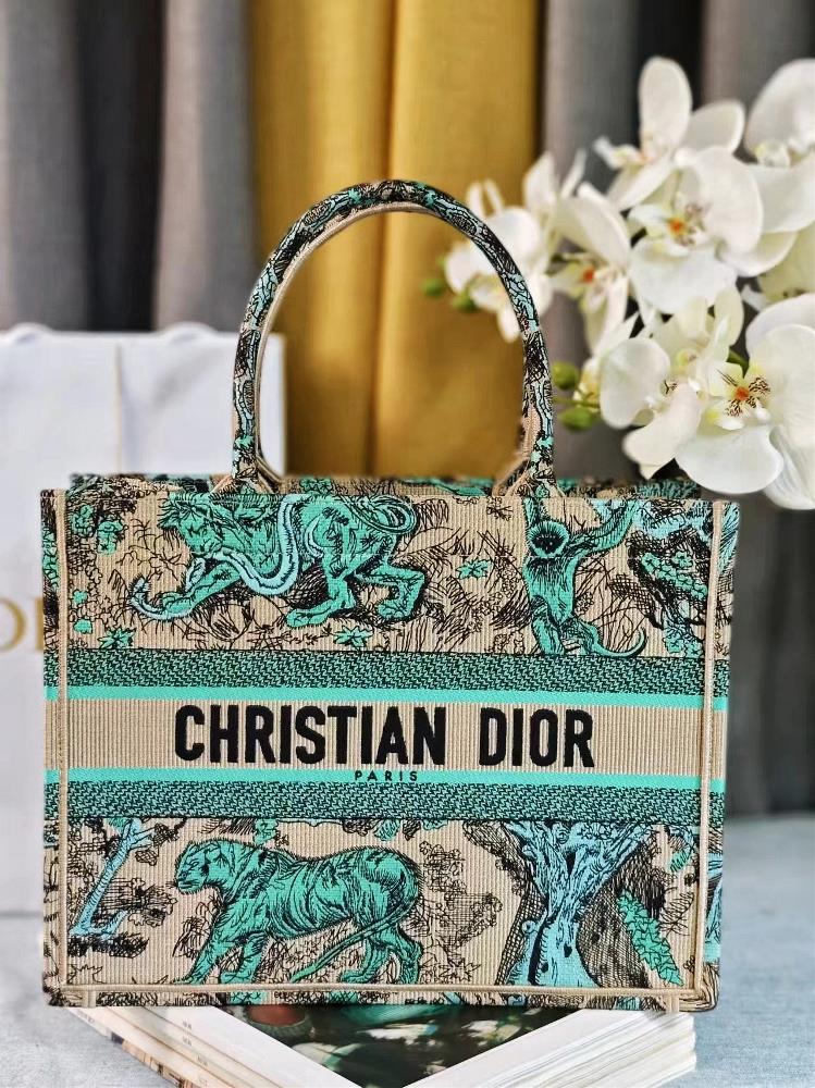 Dior Book Tote The handbag is designed by Maria Grazia Chiuri the creative director of womens clothing and is a flagship product that embodies aest