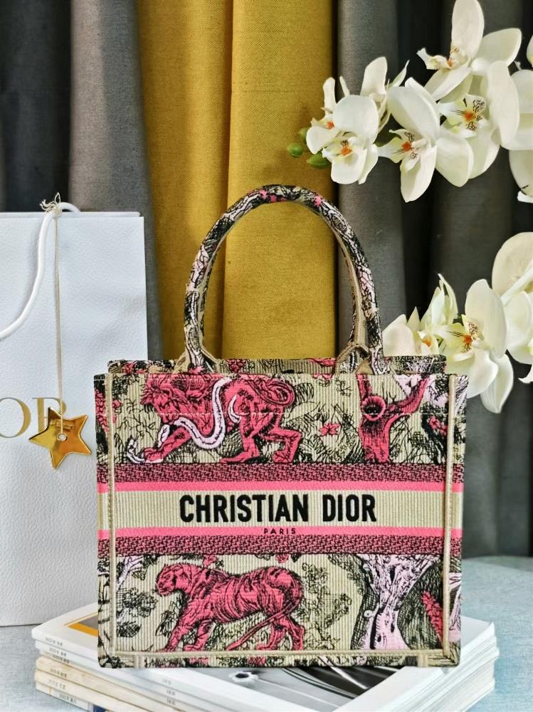 Dior Book Tote This handbag is designed by Maria Grazia Chiuri the creative director of womens clothing and is a flagship product that embodies aes