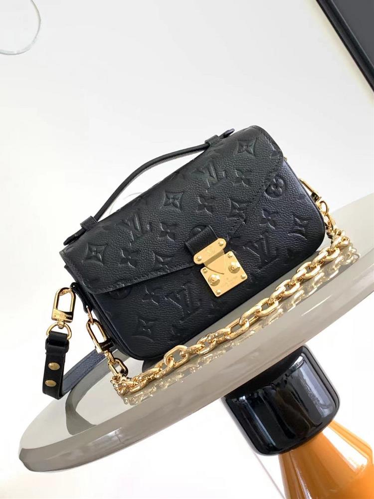 M46595 This Pochette Mtis East West handbag is made of Monogram Imprente embossed leather showcasing the fusion of brand style and modern elements T