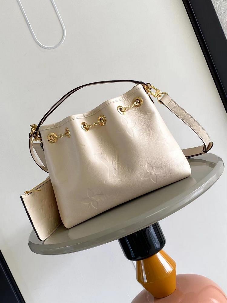 M46545 M46492 This Summer Bundle handbag is from the Dgrade collection featuring a brand new drawstring design that adds a summer vibe The Monogram