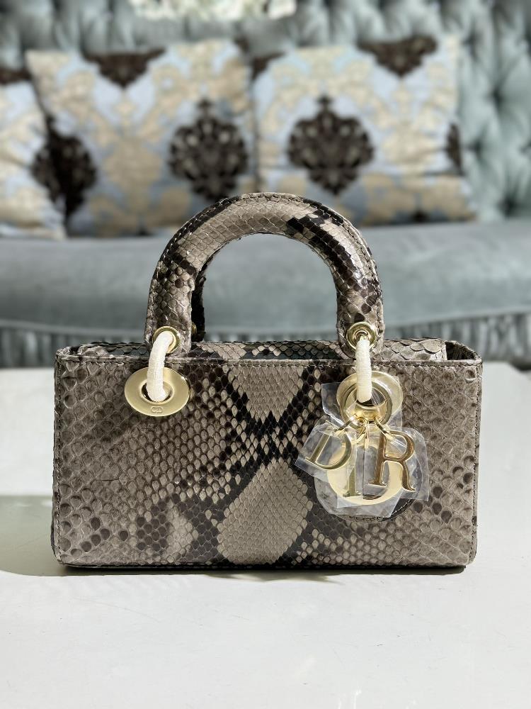 Lady Dior imported python skin paired with gold hardwarePaired with a detachable chain shoulder strap and an adjustable portable or crossbody it is