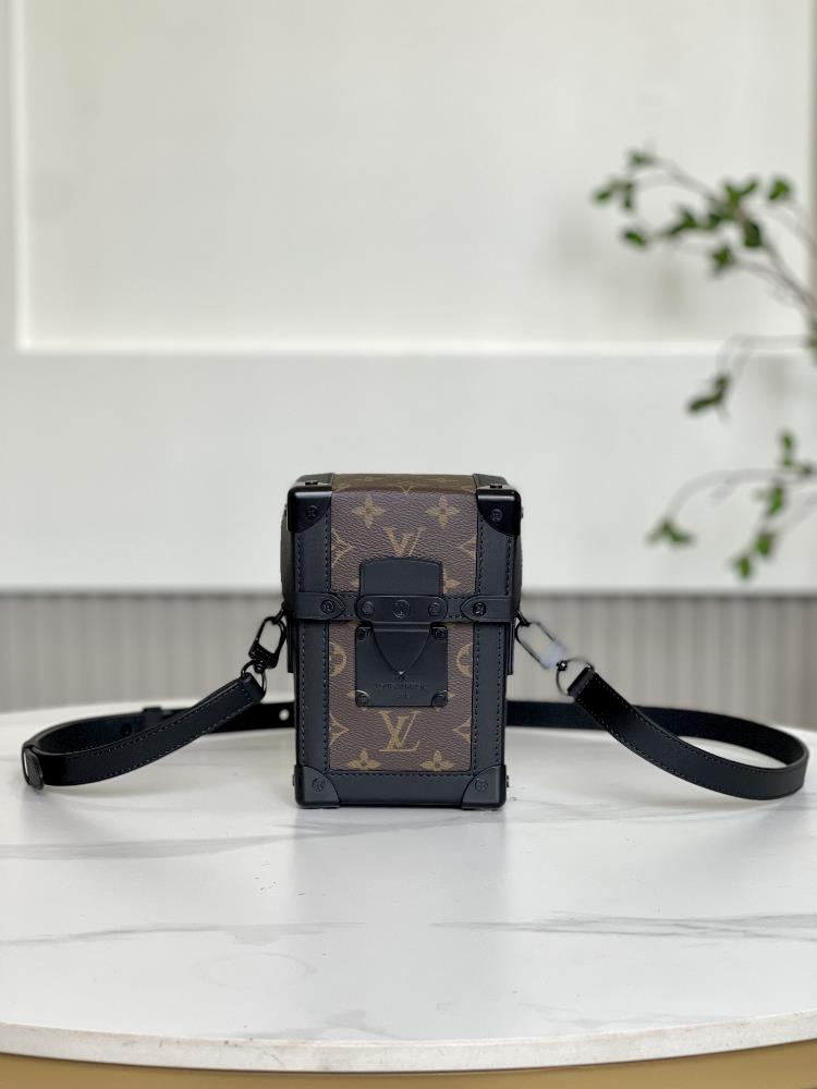 M82077 Old FlowerThe Vertical Trunk mini handbag showcases the box making heritage and modern concept Taurillon leather embossed with classic Monogra