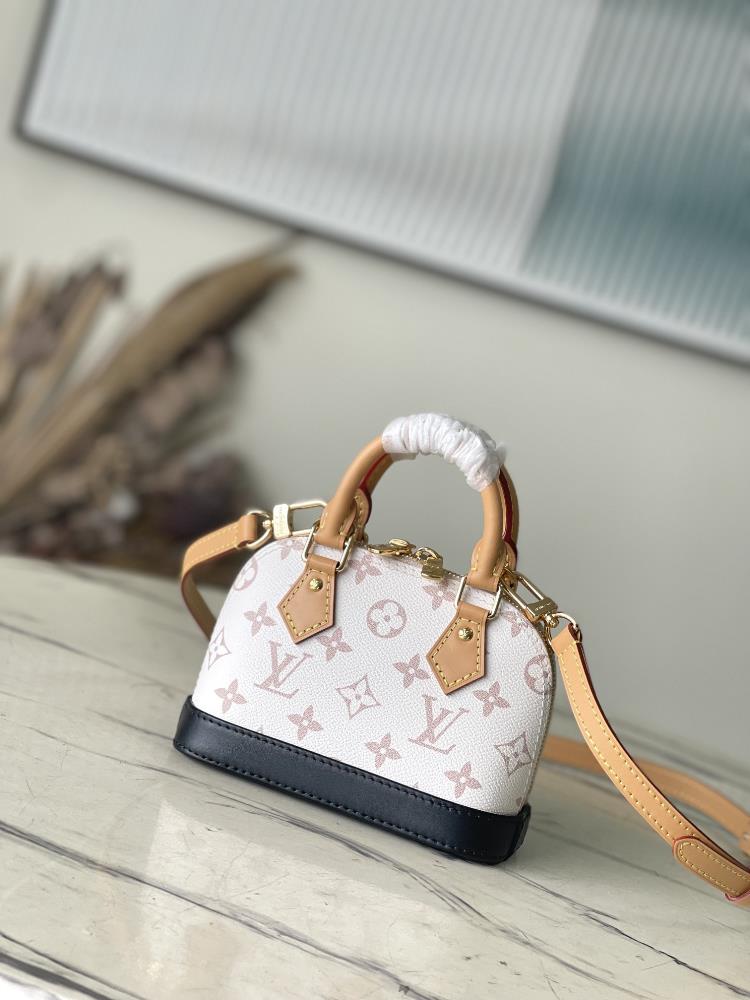 M4689582717 White FlowerThis Nano Alma handbag embodies the classic configuration of the Alma handbag with leather trim outlined on Monogram Dune can