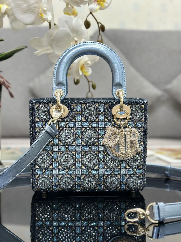 Lady Diors four panel embroidered rhinestone blue with sheep tendons inside is meticulously crafted from satin material The rattan pattern is embr