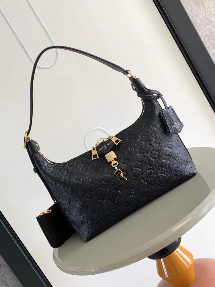 M46610 m46609 The Sac Sport handbag is made of soft Monogram Imprente embossed leather with a curved silhouette paying tribute to the brands collect