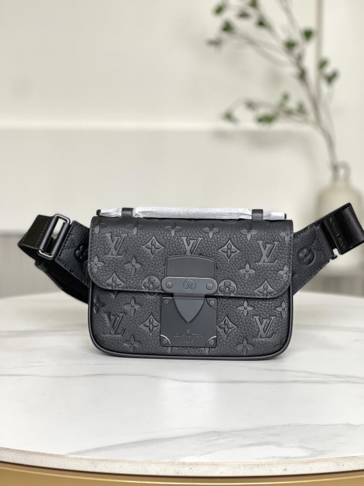 M58487 black embossedThis new S Lock Sling handbag is made of Monogram embossed black Taurillon leather elegant and modern Inspired by the creative