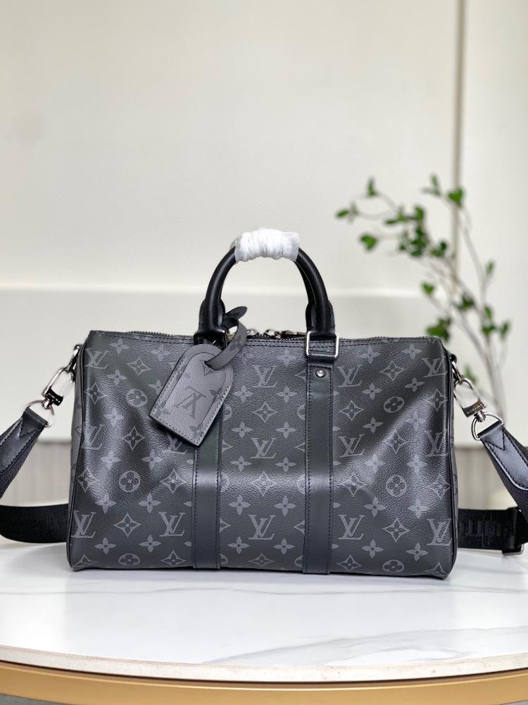 M46655 Black FlowerThis Keepall Bandoulire 35 handbag uses Monogram Eclipse coated canvas to convey an understated aura The leather top handle side