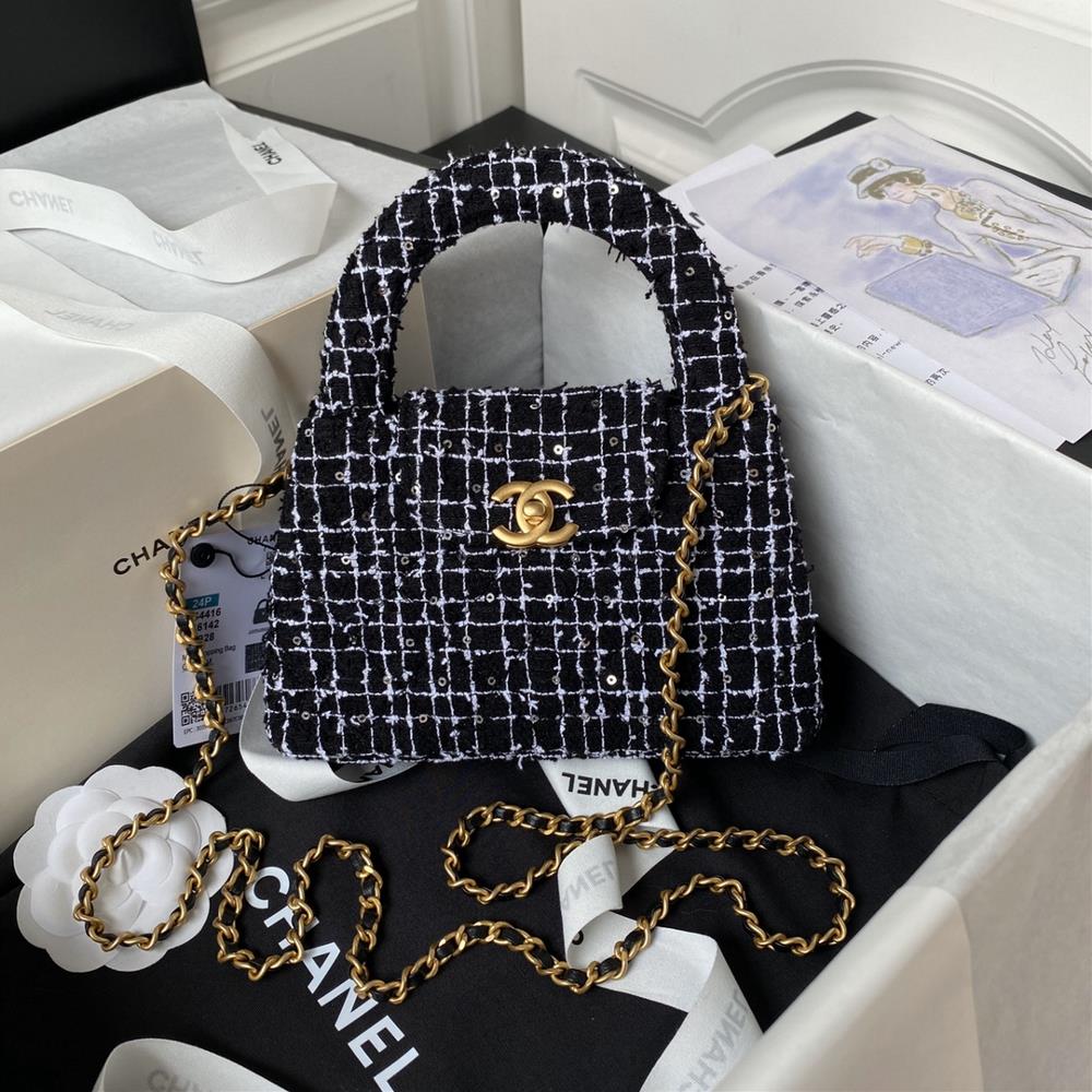 Chanel24p woolen beaded piece As4416 is a stunning Parisian feminine style black and white handbag with a large glowing colored woolen fabric paired w