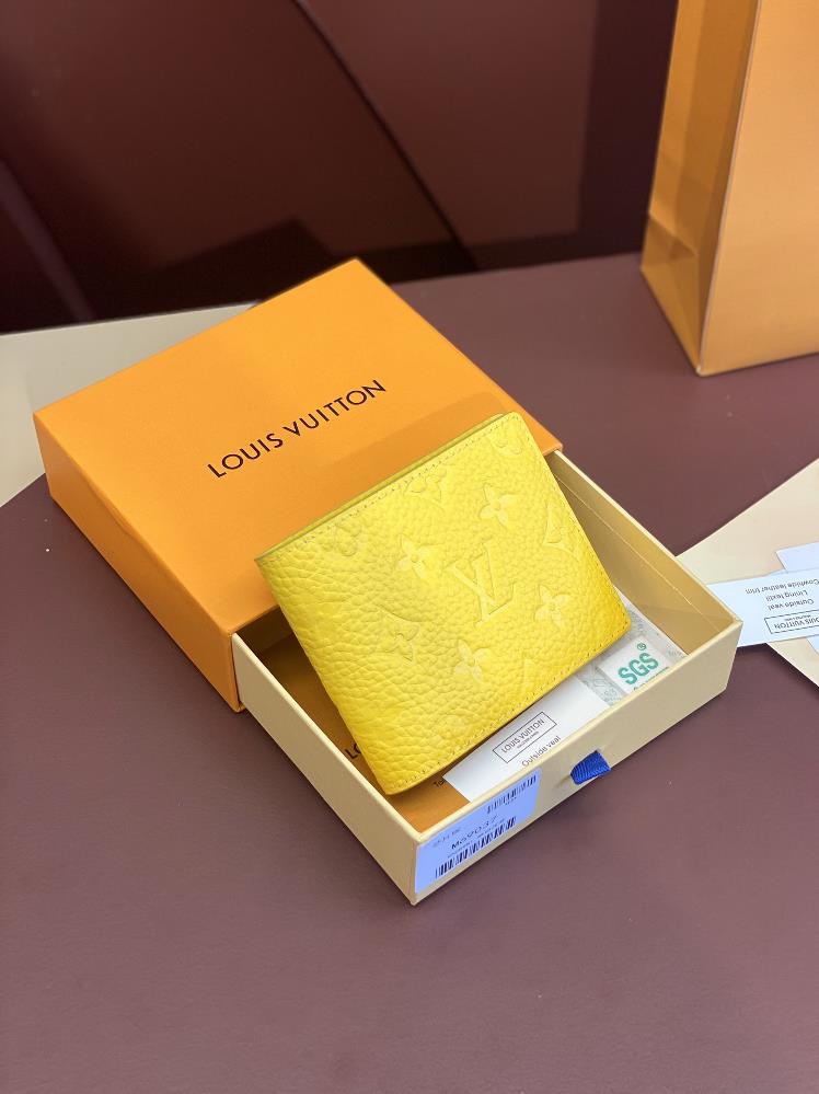 M69037 yellow chip version made of top layer cowhide This Multiple wallet features classic Monogram embossing on the surface of full grain Taurillon