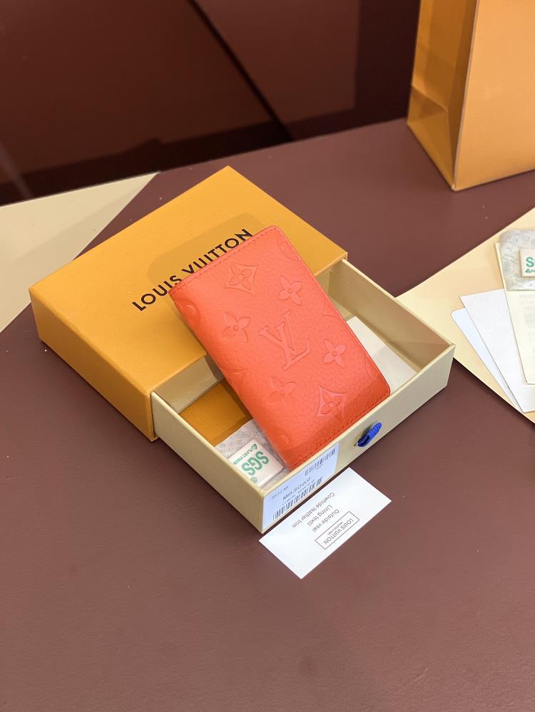 M83069 orange chip version made of top layer cowhide This pocket wallet is made of full grain Taurillon leather subtly featuring LV letters and Mon