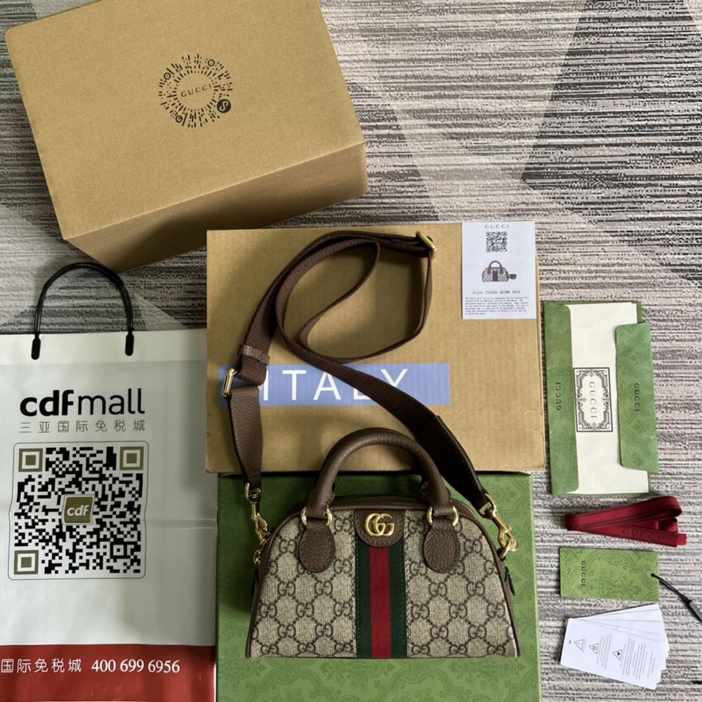 Equipped with a complete set of Ophidia series mini GG handbags in green packaging GG Supreme canvas has become the flagship fabric in Guccis desi