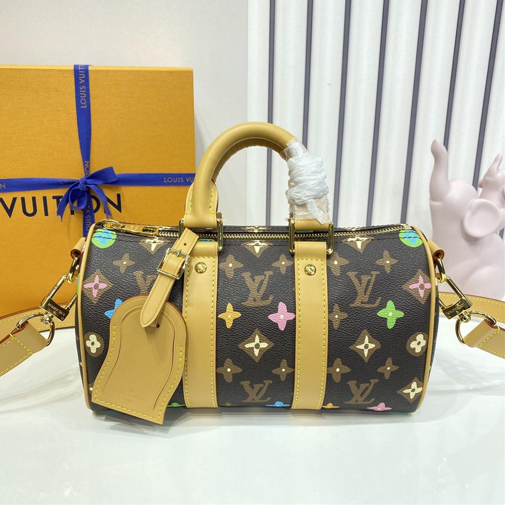 M24849 CoffeeThis Keepall Bandoulire 25 handbag is made from Monogram Craggy canvas and features a colorful hand drawn Monogram pattern daisy and cu