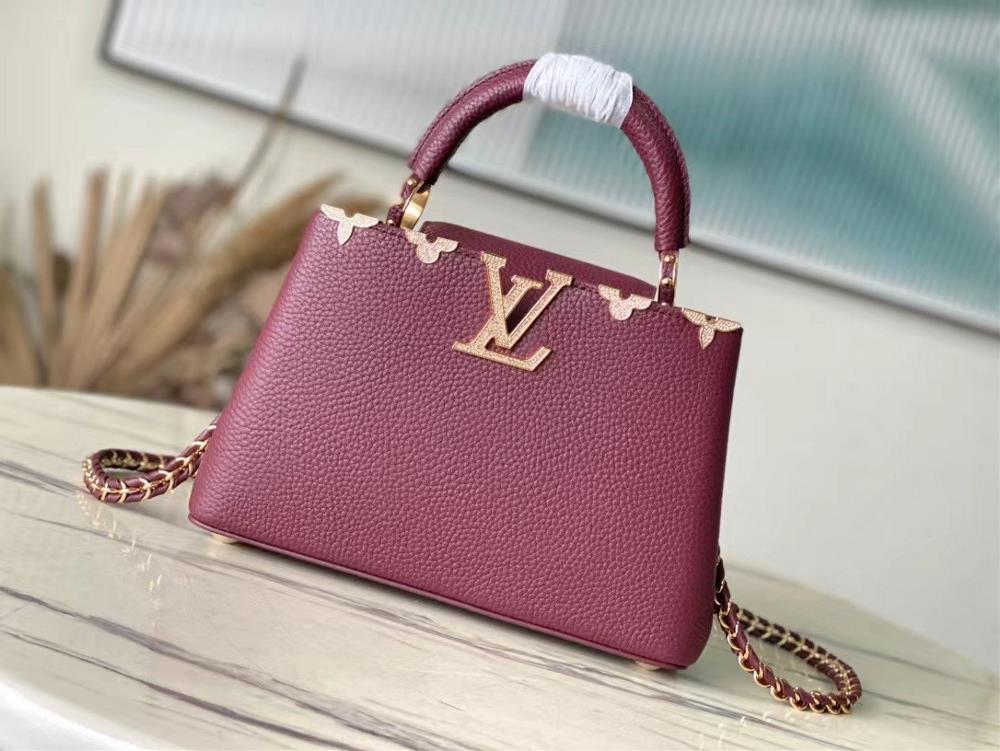 M24583 Purple Red Gold Diamond Corolla Small This Capuchines Flower Crown handbag is made of full grain Taurillon leather embellished with Monogram fl