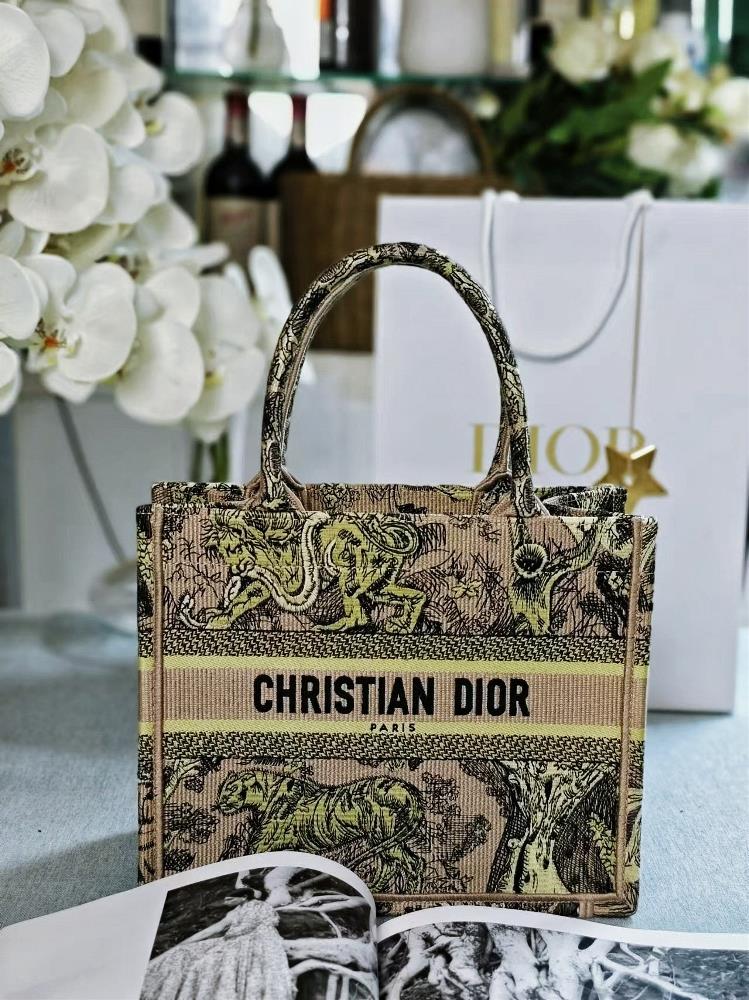 Dior Book Tote This handbag is designed by Maria Grazia Chiuri the creative director of womens clothing and is a flagship product that embodies aes