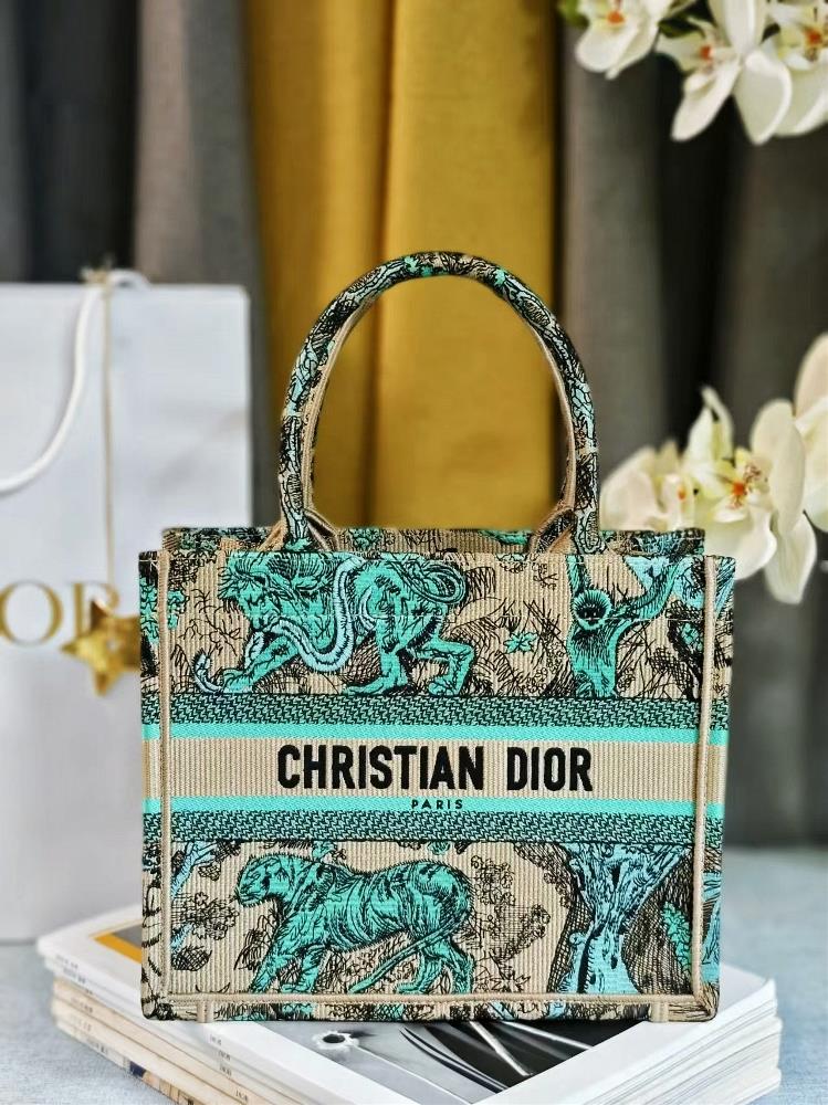 Dior  Book Tote This handbag is designed by Maria Grazia Chiuri the creative director of womens clothing and is a flagship product that embodies ae