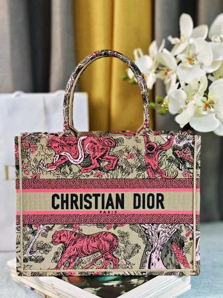 Dior Book Tote The handbag is designed by Maria Grazia Chiuri the creative director of womens clothing and is a flagship product that embodies aest