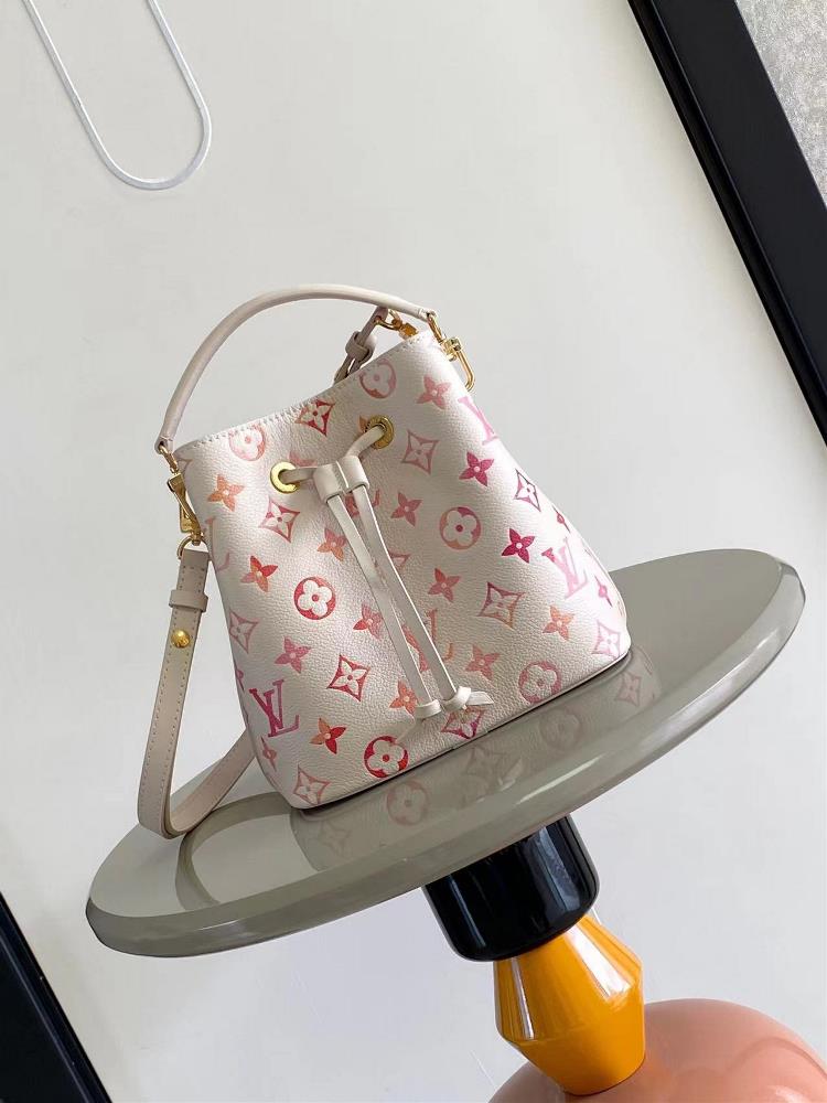 M45709 M45716 Full Leather Mini Bucket Bag This NoNo BB bucket bag features a pink gradient of Monogram Imprente leather rendered Monogram Giant patte