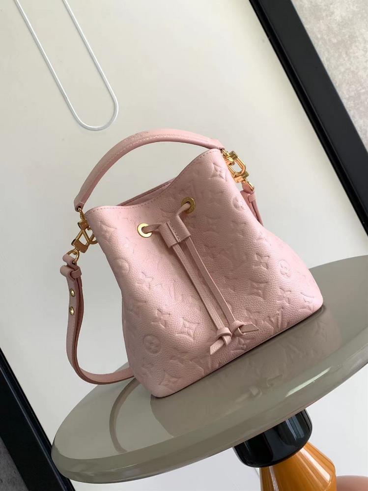 M47038  M45709This NoNo BB bucket bag features a pink gradient of Monogram Imprente leather rendered Monogram Giant patterns creating a festive atmos