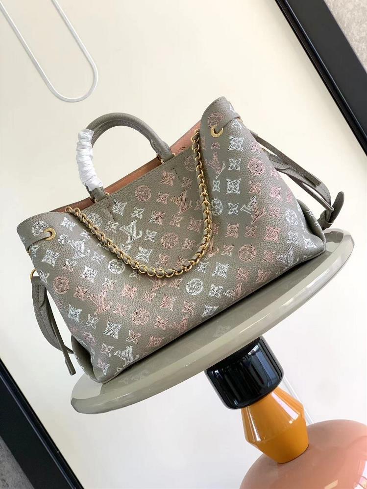 M23395 gray silk screen printed Bella Tote handbag combines a bucket bag and travel bag with perforated cowhide leather The soft configuration and so