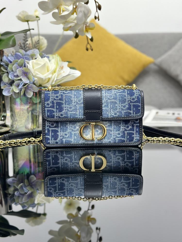 The Denim Blue 30 Montaigne EastWest chain bag features an elegant design that enhances the style of the collection Crafted with blue Denim Dior Obli