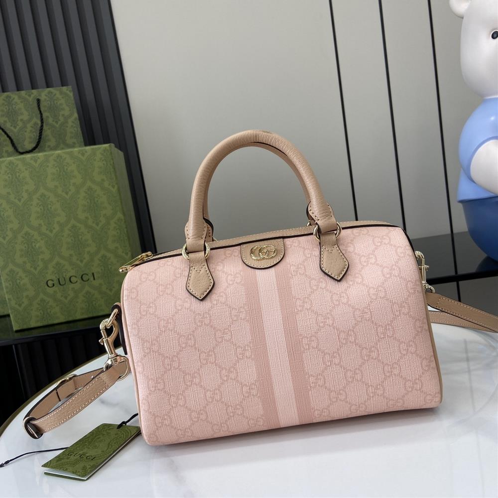 The new Ophidia series GG small handbag GG Supreme canvas showcases multiple Gucci handbag collections achieving a classic style This small handbag