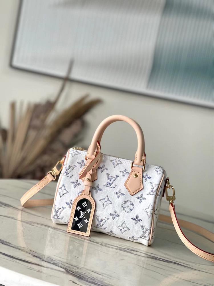 M24709   This Speedy Bandoulire 20 handbag is from the Nautical collection featuring a colorful yarn woven Monogram pattern presenting a unique colo