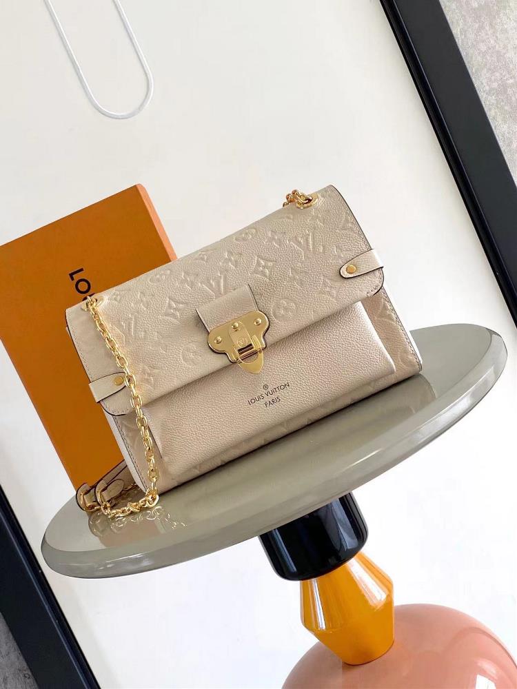 VAVIN Small Handbag M43931 Milk WhiteCrafted from a blend of smooth and embossed Monogram Imprente cowhide this Vavin small handbag features a bright