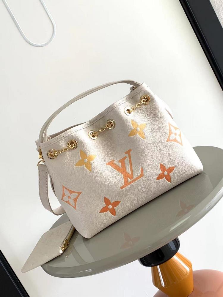 M46545 M46492 This Summer Bundle handbag is from the Dgrade collection featuring a brand new drawstring design that adds a summer vibe The Monogram