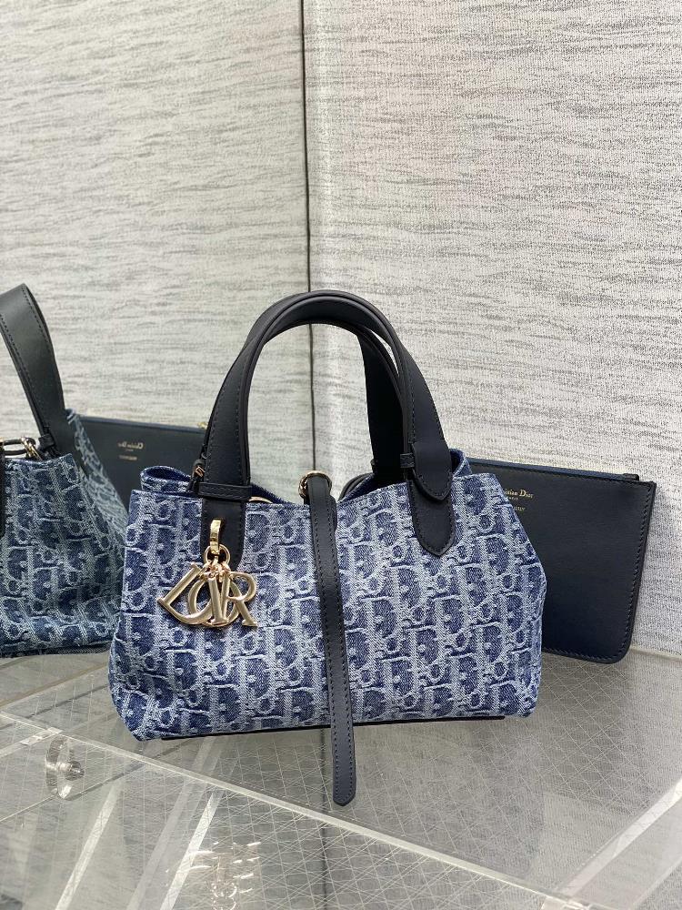 Toujours small spot goodsThe Toujours denim collection has been showcased in this bag featuring an irregular stone wash effect that rejuvenates the c