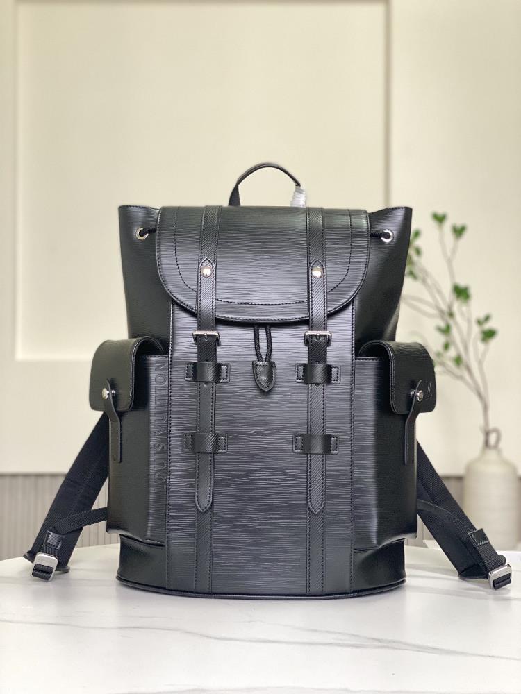 M24326 Black CHRISTOPHER Medium BackpackThis backpack features a brands classic configuration with bright hues and an enlarged version of the tradit