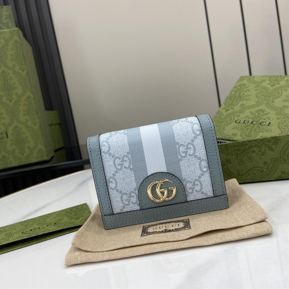 New GG Ophidia series GG card bag GG Supreme canvas interprets Guccis small leather goods collection achieving a classic style This Ophidia series
