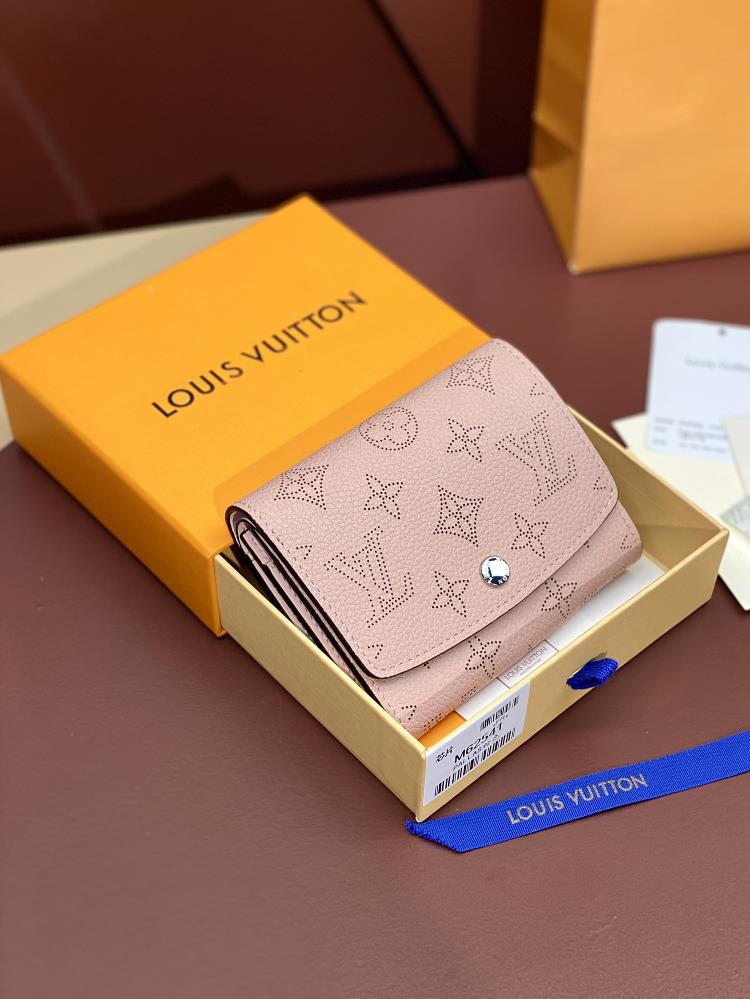 The M62541 pink chip version and IRIS COMPACT wallet are made of soft Mahina leather with Louis Vuittons unique Monogram perforated flower pattern T