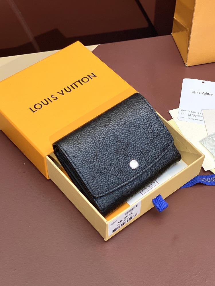 The M62540 black chip version and IRIS COMPACT wallet are made of soft Mahina leather with Louis Vuittons unique Monogram perforated flower pattern