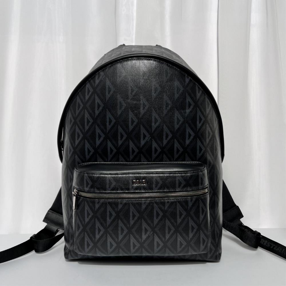 Spot photo 9946 This Rider backpack has a simple outline and a classic college style that exudes vitality Crafted with black CD Diamond patterned ca