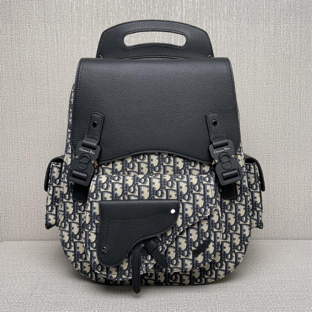 This large 9048Gallop backpack features a stylish original design that highlights the classic saddle style logo Crafted with beige and black Oblique