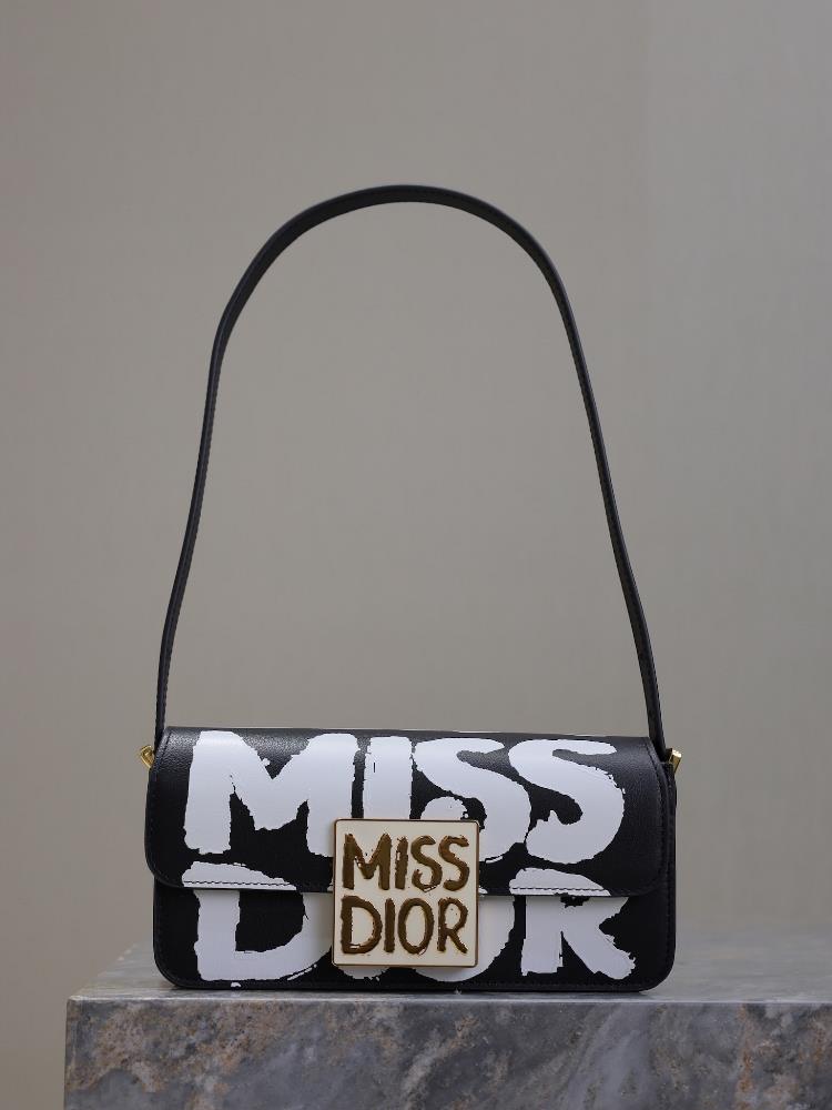 Miss Dior Flip Bag Black GraffitiThis Miss Dior flip handbag made a brand new appearance at the Dior FallWinter 2024 ready to wear collection reinte