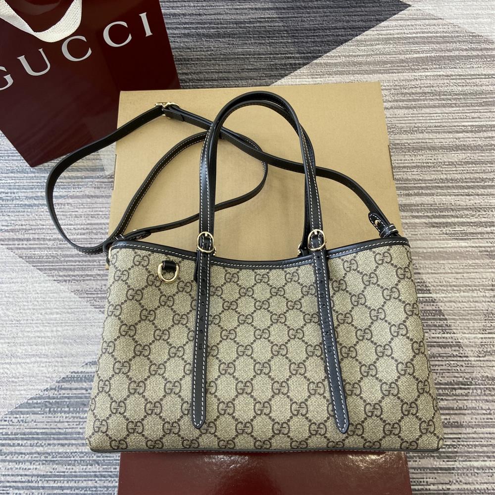 This shopping bag comes with a complete set of packaging The GG pattern and striped ribbon two distinctive elements of the brand blend together t