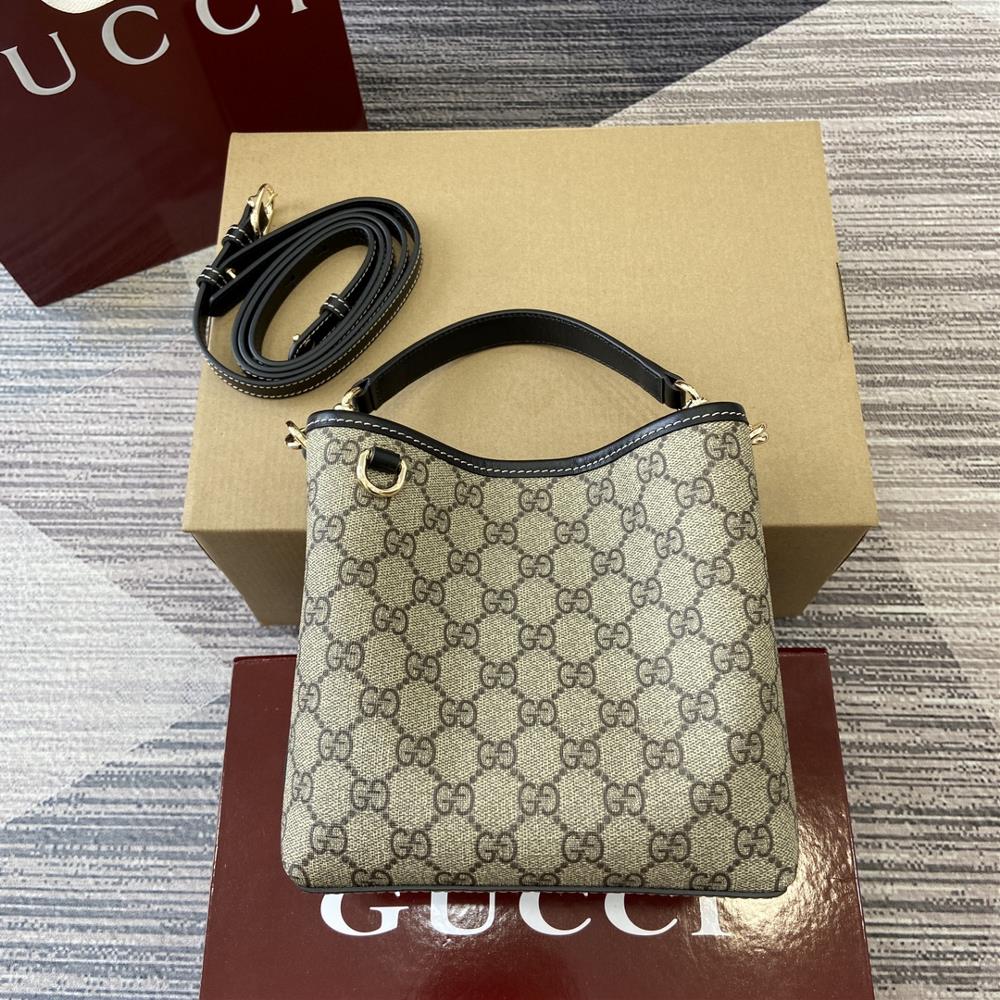 This shopping bag comes with a complete set of packaging The GG pattern and striped ribbon two distinctive elements of the brand blend together t