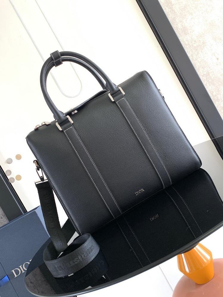 This briefcase is a new item in the Dior Lingot collection blending classic elegance with Diors haute couture spirit The structure is distinct car