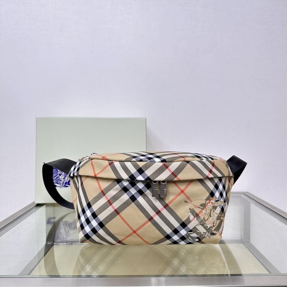 Bs latest waist bag decorated with a woven Bur exclusive plaid pattern The interior is made of the same fabric and adorned with the equestrian knig