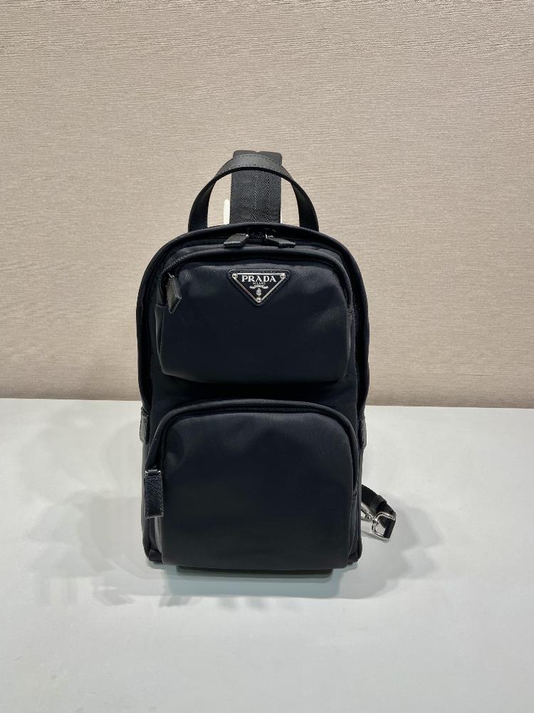 New Chest Bag 2VZ105This ReNylon recycled nylon and Saffiano leather backpack features a modern single shoulder design style leather handles adjusta